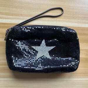 Like New Big Budda Wristlet. No stains on interior.